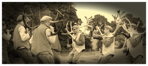 of horns, in homage, dance